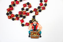 Muscular Pirate with his Gold Chest and Black and Red Bead